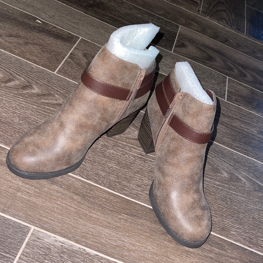 KYLIE she is a size 8 and has never been worn!!